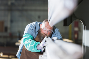 Man cutting metal